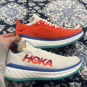 Hoka Carbon X Vibrant Orange and White Sneakers